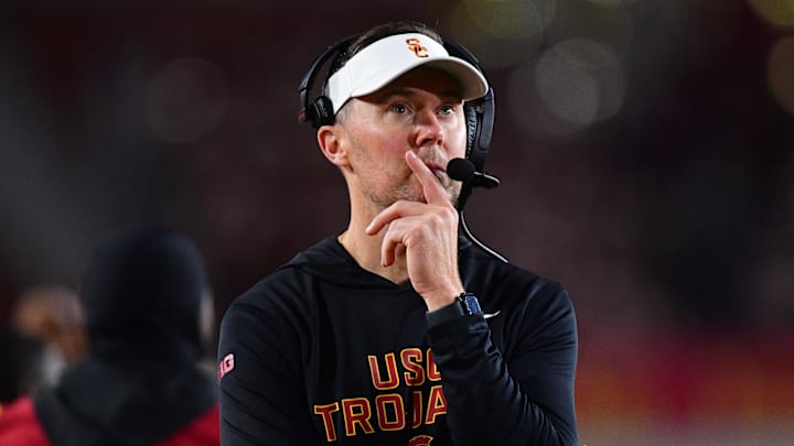 Nov 7, 2025; Los Angeles, California, USA; Southern California Trojans head coach Lincoln Riley watches game action against the Northwestern Wildcats during the second half at the Los Angeles Memorial Coliseum. Mandatory Credit: Gary A. Vasquez-Imagn Images