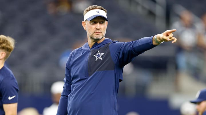 Dallas Cowboys head coach Brian Schottenheimer gives directions before the game against the Atlanta Falcons at AT&T Stadium 