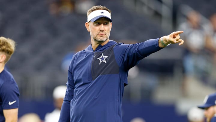 Cowboys head coach Brian Schottenheimer gives directions prior to the game against the Atlanta Falcons Cowboys head coach Brian Schottenheimer gives directions prior to the game against the Atlanta Falcons