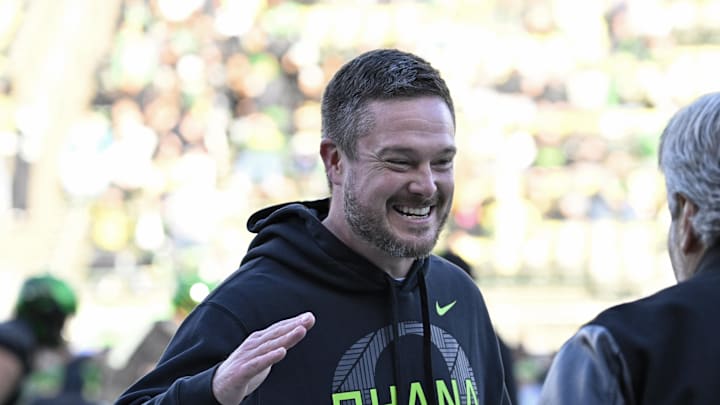 Nov 22, 2025; Eugene, Oregon, USA; Oregon Ducks head coach Dan Lanning smiles before the game against the Southern California Trojans at Autzen Stadium. Nov 22, 2025; Eugene, Oregon, USA; Oregon Ducks head coach Dan Lanning smiles before the game against the Southern California Trojans at Autzen Stadium.