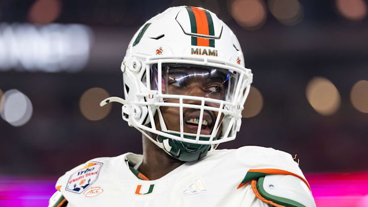 Jan 8, 2026; Glendale, AZ, USA; Miami Hurricanes defensive lineman Rueben Bain Jr. (4) against the Mississippi Rebels during the 2026 Fiesta Bowl and semifinal game of the College Football Playoff at State Farm Stadium.