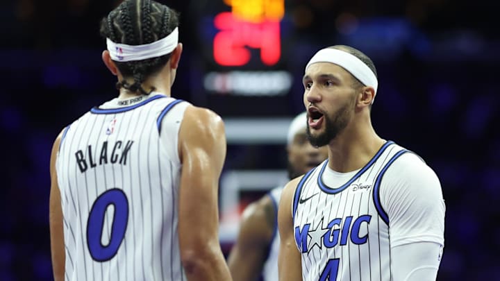 Nov 25, 2025; Philadelphia, Pennsylvania, USA; Orlando Magic guard Anthony Black (0) reacts with guard Jalen Suggs (4) after scoring against the Philadelphia 76ers during the second quarter at Xfinity Mobile Arena. Mandatory Credit: Bill Streicher-Imagn Images Nov 25, 2025; Philadelphia, Pennsylvania, USA; Orlando Magic guard Anthony Black (0) reacts with guard Jalen Suggs (4) after scoring against the Philadelphia 76ers during the second quarter at Xfinity Mobile Arena. Mandatory Credit: Bill Streicher-Imagn Images