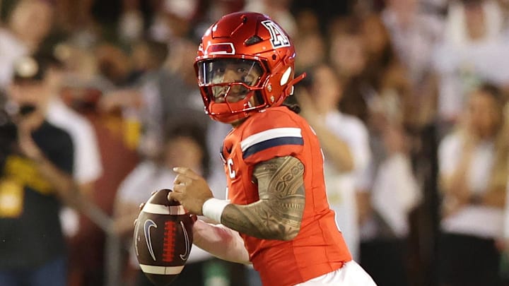 Sep 27, 2025; Ames, Iowa, USA; Arizona Wildcats quarterback Noah Fifita (1) looks to pass against the Iowa State Cyclones during the first half at Jack Trice Stadium. Mandatory Credit: Reese Strickland-Imagn Images