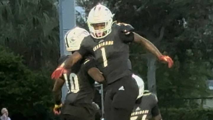 Chaminade-Madonna sensation Derrek Cooper (1) is flying high after his strip sack and fumble recovery in the Lions win over Miami Edison. Cooper is a 4-star running back/linebacker and Georgia recruit.