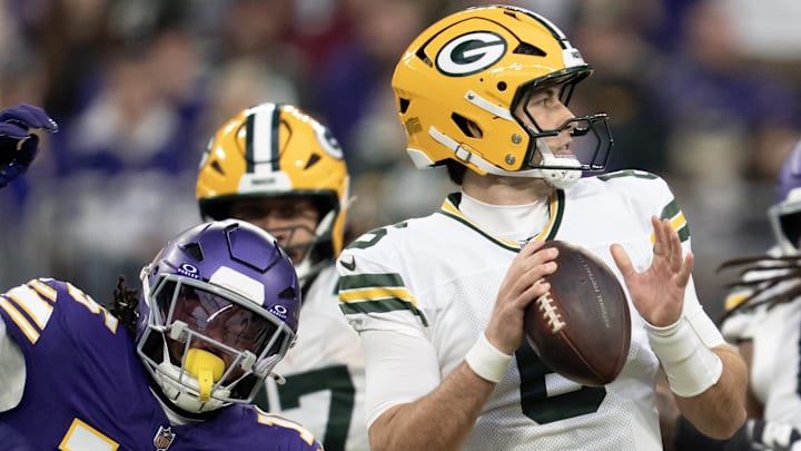 Minnesota Vikings linebacker Dallas Turner (15) pressures Green Bay Packers quarterback Clayton Tune. Minnesota Vikings linebacker Dallas Turner (15) pressures Green Bay Packers quarterback Clayton Tune.