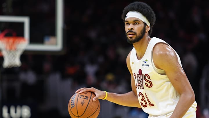 Nov 29, 2024; Atlanta, Georgia, USA; Cleveland Cavaliers center Jarrett Allen (31) dribbles the ball in the game against the Atlanta Hawks during the fourth quarter at State Farm Arena. Mandatory Credit: Jordan Godfree-Imagn Images