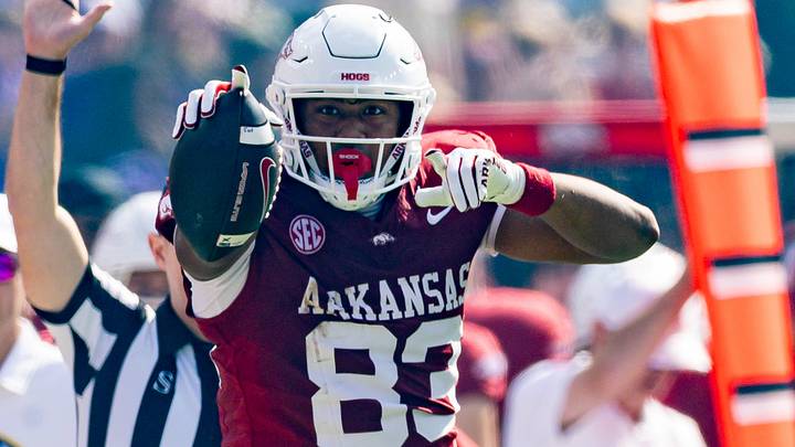 Arkansas Razorbacks tight end Jaden Platt (83) reacts to making a first down against LSU Tigers defensive back A.J. Haulcy (not pictured) during the first half at Tiger Stadium.