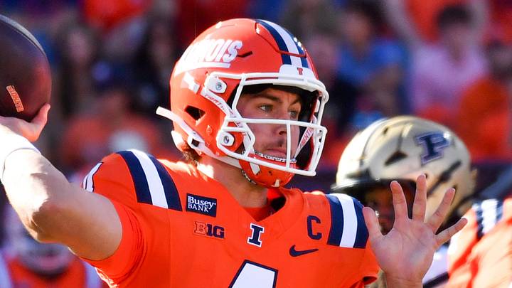 Oct 3, 2026; Champaign, Illinois, USA; Illinois Fighting Illini quarterback Katin Houser (4) passes the ball during the first half against the Purdue Boilermakers at Gies Memorial Stadium. Mandatory Credit: Ron Johnson-Imagn Images Oct 3, 2026; Champaign, Illinois, USA; Illinois Fighting Illini quarterback Katin Houser (4) passes the ball during the first half against the Purdue Boilermakers at Gies Memorial Stadium. Mandatory Credit: Ron Johnson-Imagn Images