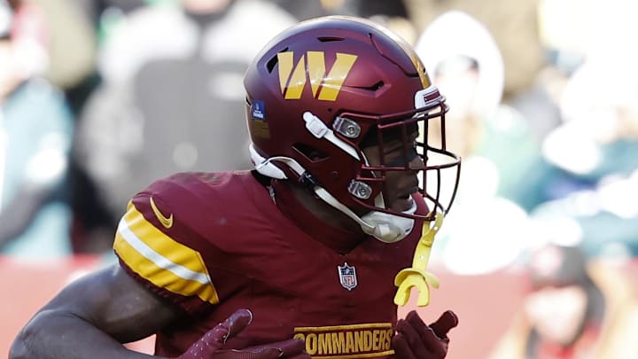 Dec 22, 2024; Landover, Maryland, USA; Washington Commanders wide receiver Terry McLaurin (17) celebrates after catching a touchdown pass against the Philadelphia Eagles during the second quarter at Northwest Stadium. Mandatory Credit: Geoff Burke-Imagn Images Dec 22, 2024; Landover, Maryland, USA; Washington Commanders wide receiver Terry McLaurin (17) celebrates after catching a touchdown pass against the Philadelphia Eagles during the second quarter at Northwest Stadium. Mandatory Credit: Geoff Burke-Imagn Images