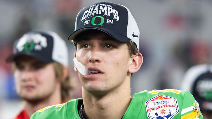 Jan 1, 2024; Glendale, AZ, USA; Oregon Ducks quarterback Austin Novosad (16) against the Liberty Flames during the 2024 Fiesta Bowl at State Farm Stadium. Mandatory Credit: Mark J. Rebilas-Imagn Images Jan 1, 2024; Glendale, AZ, USA; Oregon Ducks quarterback Austin Novosad (16) against the Liberty Flames during the 2024 Fiesta Bowl at State Farm Stadium. Mandatory Credit: Mark J. Rebilas-Imagn Images