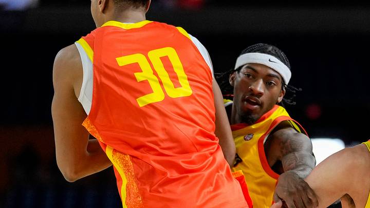 West All-Stars Miami (OH) Peter Suder (12) rushes up the court against East All-Stars Utah State Mj Collins Jr. (5) on Friday, April 3, 2026, during the Reese's DI College All-Stars game at Lucas Oil Stadium in Indianapolis. West All-Stars Miami (OH) Peter Suder (12) rushes up the court against East All-Stars Utah State Mj Collins Jr. (5) on Friday, April 3, 2026, during the Reese's DI College All-Stars game at Lucas Oil Stadium in Indianapolis.