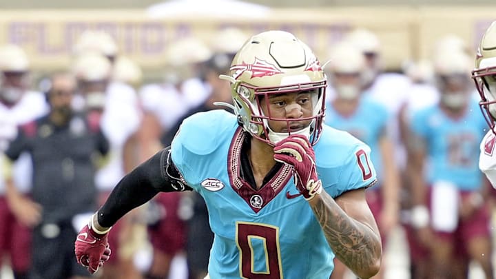 Apr 20, 2024; Tallahassee, Florida, USA; Florida State Seminoles defensive back Earl Little Jr (0) defends tight end Jackson West (48) during the Spring Showcase at Doak S. Campbell Stadium. Mandatory Credit: Melina Myers-Imagn Images