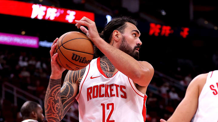 Oct 15, 2024; Houston, Texas, USA; Houston Rockets center Steven Adams (12) rebounds against the New Orleans Pelicans during the second quarter at Toyota Center. Mandatory Credit: Erik Williams-Imagn Images
