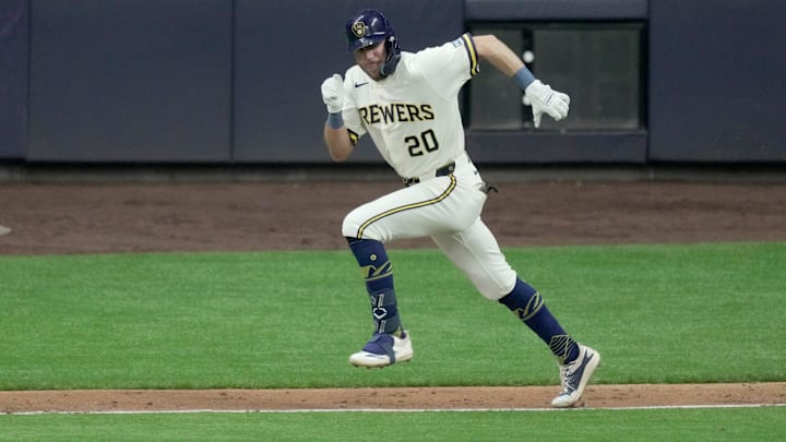 Milwaukee Brewers left fielder Brandon Lockridge (20) hits a single during the third inning of their game against the Tampa Bay Rays Monday, March 30, 2026 American Family Field in Milwaukee, Wisconsin.