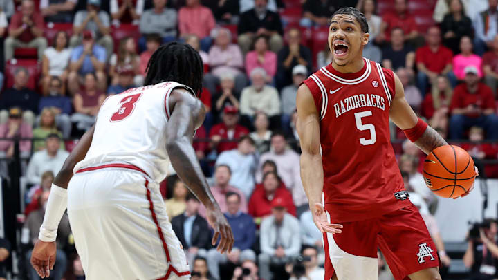 Arkansas Razorback guard Darius Acuff Jr. (5) dribbles against Alabama Crimson Tide guard Latrell Wrightsell Jr. (3) Arkansas Razorback guard Darius Acuff Jr. (5) dribbles against Alabama Crimson Tide guard Latrell Wrightsell Jr. (3)