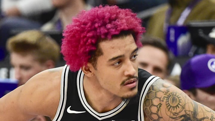 Jan 22, 2026; Salt Lake City, Utah, USA; San Antonio Spurs forward Jeremy Sochan (10) stretches before substituting in during the second half against the Utah Jazz at Delta Center. Mandatory Credit: Peter Creveling-Imagn Images