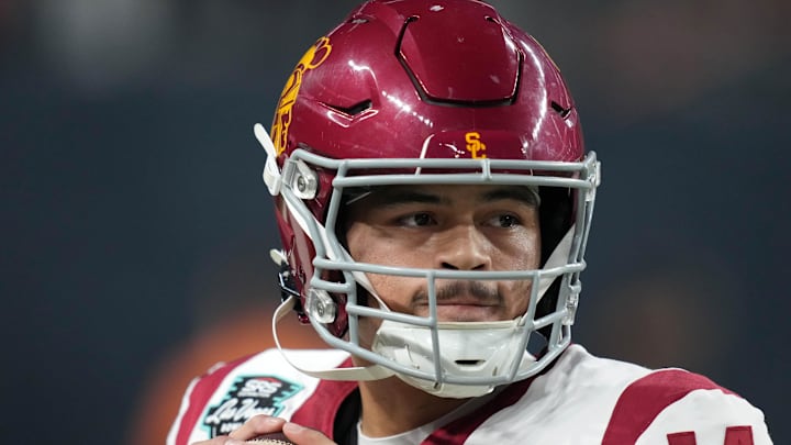 Dec 27, 2024; Las Vegas, NV, USA; Southern California Trojans quarterback Jayden Maiava (14) throws the ball against the Texas A&M Aggies in the first half at Allegiant Stadium. Mandatory Credit: Kirby Lee-Imagn Images Dec 27, 2024; Las Vegas, NV, USA; Southern California Trojans quarterback Jayden Maiava (14) throws the ball against the Texas A&M Aggies in the first half at Allegiant Stadium. Mandatory Credit: Kirby Lee-Imagn Images