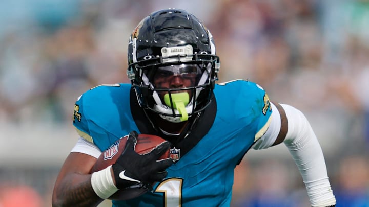 Jacksonville Jaguars running back Travis Etienne Jr. (1) rushes for yards during the second quarter Sunday, Dec. 15, 2024 at EverBank Stadium in Jacksonville, Fla. Jacksonville Jaguars running back Travis Etienne Jr. (1) rushes for yards during the second quarter Sunday, Dec. 15, 2024 at EverBank Stadium in Jacksonville, Fla.