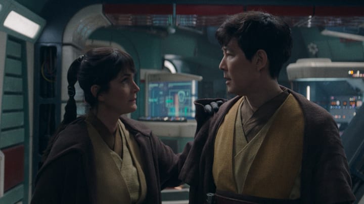 (L-R): Jedi Master Indara (Carrie-Anne Moss) and Sol (Lee Jung-jae) in Lucasfilm's Star Wars THE ACOLYTE, season one, exclusively on Disney+. ©2024 Lucasfilm Ltd. & TM. All Rights Reserved.
