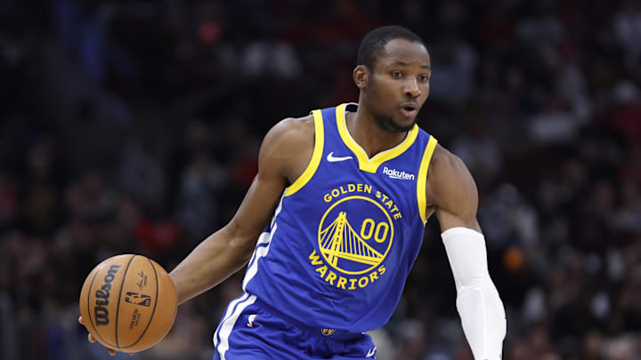 Jan 12, 2024; Chicago, Illinois, USA; Golden State Warriors forward Jonathan Kuminga (00) dribbles during the first half against the Chicago Bulls at United Center. Mandatory Credit: Kamil Krzaczynski-Imagn Images