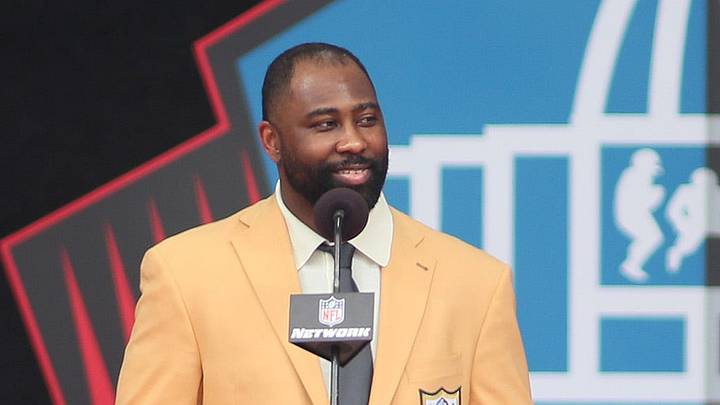 Hall of Fame Enshrinee Darrelle Revis smiles at the crowd during his speech while being inducted into the Pro Football Hall of Fame Saturday afternoon at Tom Benson Hall of Fame Stadium in Canton, Ohio. Hall of Fame Enshrinee Darrelle Revis smiles at the crowd during his speech while being inducted into the Pro Football Hall of Fame Saturday afternoon at Tom Benson Hall of Fame Stadium in Canton, Ohio.