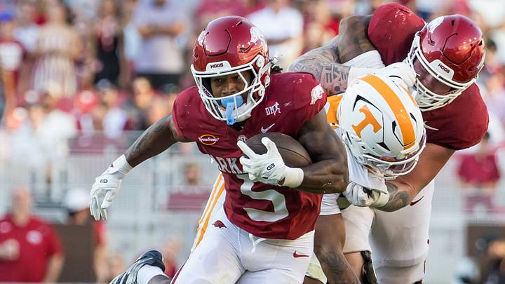 Arkansas Razorbacks running back Sutton Smith (5) runs the ball during the third quarter against the Tennessee Volunteers at Razorback Stadium. Arkansas Razorbacks running back Sutton Smith (5) runs the ball during the third quarter against the Tennessee Volunteers at Razorback Stadium.