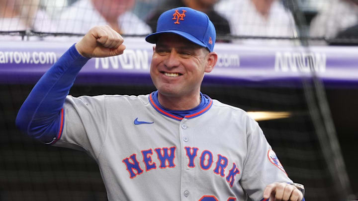 Jun 7, 2025; Denver, Colorado, USA; New York Mets manager Carlos Mendoza (64) before the game against the Colorado Rockies at Coors Field. Mandatory Credit: Ron Chenoy-Imagn Images