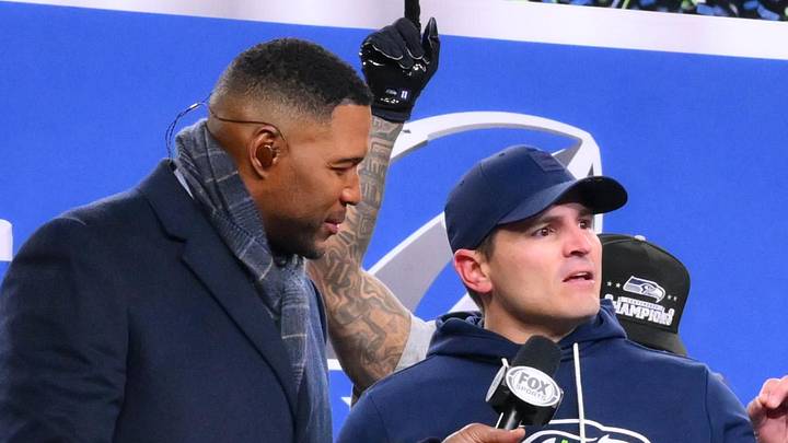 Seattle Seahawks head coach Mike Macdonald speaks on the podium after defeating the Los Angeles Rams. Seattle Seahawks head coach Mike Macdonald speaks on the podium after defeating the Los Angeles Rams.