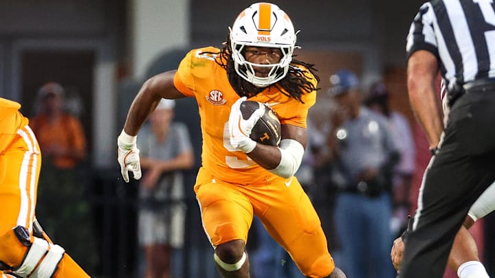 Sep 27, 2025; Starkville, Mississippi, USA; Tennessee Volunteers running back Star Thomas (9) runs with the ball against the Mississippi State Bulldogs during the second half at Davis Wade Stadium at Scott Field. Mandatory Credit: Wesley Hale-Imagn Images