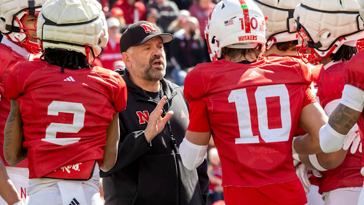 Nebraska football coach Matt Rhule huddles with the offense during the 2026 Red-White Spring Game.