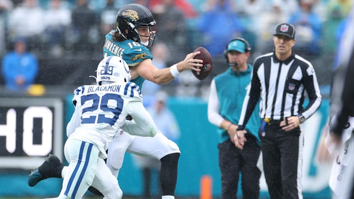 Dec 7, 2025; Jacksonville, Florida, USA; Jacksonville Jaguars quarterback Trevor Lawrence (16) carries the ball as Indianapolis Colts cornerback Mekhi Blackmon (29) defends during the second half at EverBank Stadium. Mandatory Credit: Matt Pendleton-Imagn Images Dec 7, 2025; Jacksonville, Florida, USA; Jacksonville Jaguars quarterback Trevor Lawrence (16) carries the ball as Indianapolis Colts cornerback Mekhi Blackmon (29) defends during the second half at EverBank Stadium. Mandatory Credit: Matt Pendleton-Imagn Images