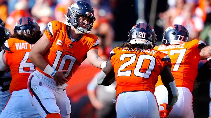 Sep 20, 2026; Denver, Colorado, USA; Denver Broncos quarterback Bo Nix (10) hands off to running back Jonah Coleman (20) during the fourth quarter against the Jacksonville Jaguars at Empower Field at Mile High. Sep 20, 2026; Denver, Colorado, USA; Denver Broncos quarterback Bo Nix (10) hands off to running back Jonah Coleman (20) during the fourth quarter against the Jacksonville Jaguars at Empower Field at Mile High.
