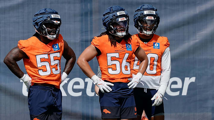 Jul 24, 2025; Englewood, CO, USA; Denver Broncos linebacker Jordan Turner (55) and linebacker Levelle Bailey (56) and linebacker Justin Strnad (40) during Denver Broncos Training Camp. 
