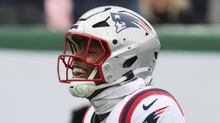 Dec 28, 2025; East Rutherford, New Jersey, USA; New England Patriots safety Jaylinn Hawkins (21) celebrates an interception against the New York Jets during the first quarter of the game at MetLife Stadium. Mandatory Credit: Vincent Carchietta-Imagn Images