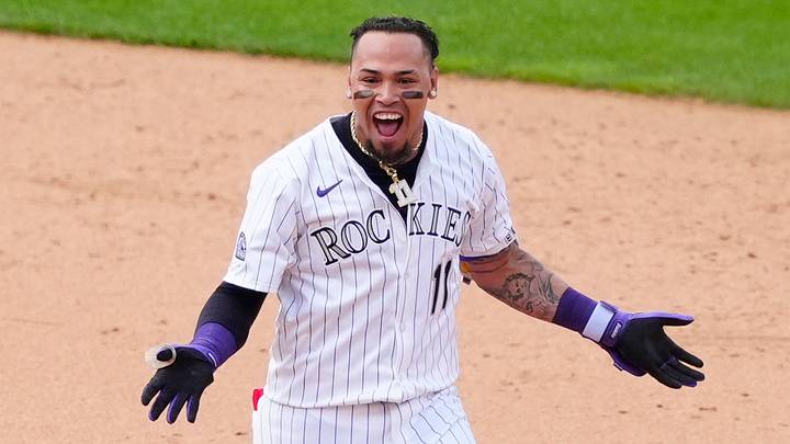 Colorado Rockies first baseman Orlando Arcia (11) celebrates