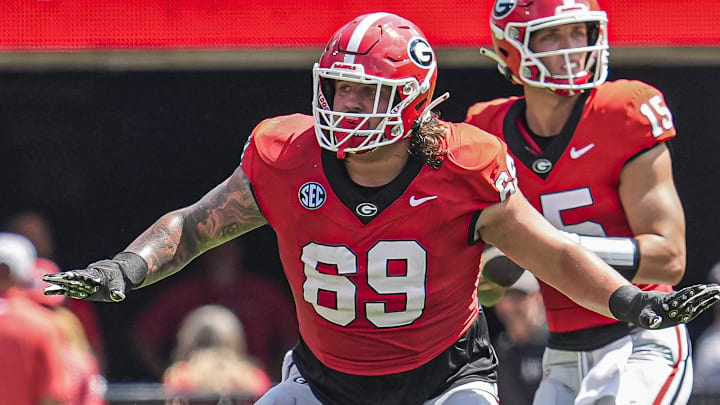 Sep 7, 2024; Athens, Georgia, USA; Georgia Bulldogs offensive lineman Tate Ratledge (69) blocks against the Tennessee Tech Golden Eagles during the first half at Sanford Stadium. Mandatory Credit: Dale Zanine-Imagn Images