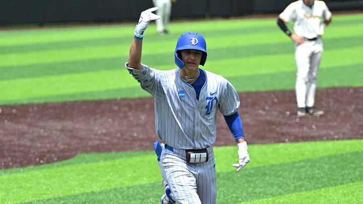 Jun 8, 2025; Durham, NC, USA; Duke Blue Devils outfielder AJ Gracia (29) celebrates a run home in the first inning against the Murray State at Racers Durham Super Regionals at Jack Coombs Field. Mandatory Credit: Zachary Taft-Imagn Images