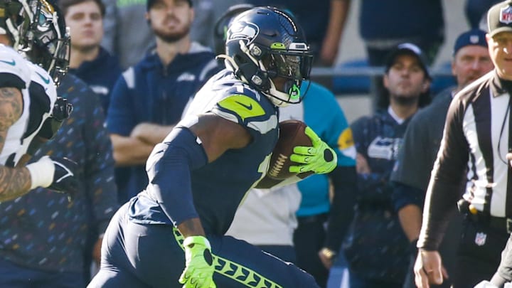 Oct 31, 2021; Seattle, Washington, USA; Seattle Seahawks wide receiver DK Metcalf (14) runs for yards after the catch against the Jacksonville Jaguars during the second quarter at Lumen Field. Mandatory Credit: Joe Nicholson-Imagn Images