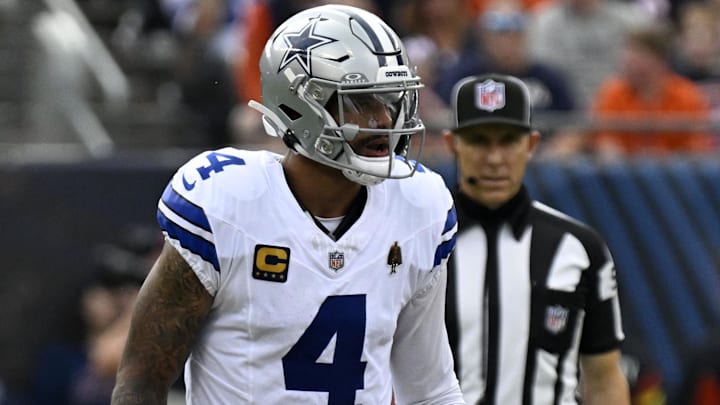 Dallas Cowboys quarterback Dak Prescott (4) calls out an audible against the Chicago Bears during the first half at Soldier Field.
