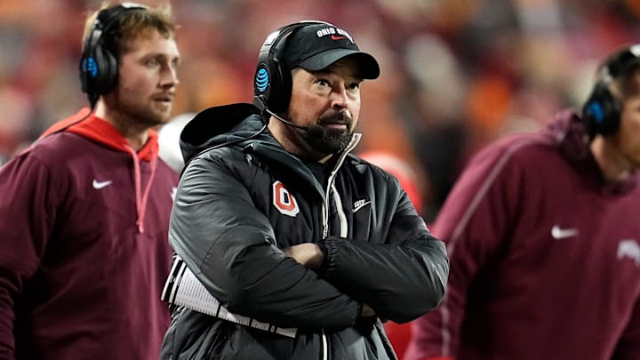 Ohio State Buckeyes head coach Ryan Day watches from the sideline during the first half of the College Football Playoff first round game against the Tennessee Volunteers at Ohio Stadium in Columbus on Dec. 21, 2024. Ohio State Buckeyes head coach Ryan Day watches from the sideline during the first half of the College Football Playoff first round game against the Tennessee Volunteers at Ohio Stadium in Columbus on Dec. 21, 2024.