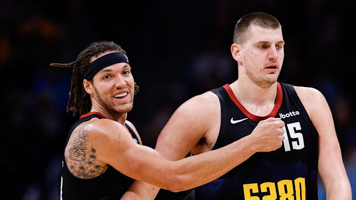 Dec 18, 2023; Denver, Colorado, USA; Denver Nuggets forward Aaron Gordon (50) reacts with center Nikola Jokic (15) in the third quarter against the Dallas Mavericks at Ball Arena. Dec 18, 2023; Denver, Colorado, USA; Denver Nuggets forward Aaron Gordon (50) reacts with center Nikola Jokic (15) in the third quarter against the Dallas Mavericks at Ball Arena.