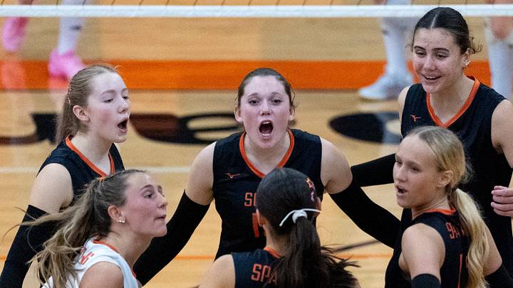 Solon celebrates a point Oct. 15, 2026 during the WaMaC Conference volleyball championship against Clear Creek Amana at Solon High School in Solon, Iowa.