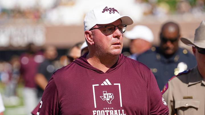 Texas A&M Aggies head coach Mike Elko leaves the field after the first half against the Missouri Tigers during the first half of the game at Faurot Field at Memorial Stadium. Texas A&M Aggies head coach Mike Elko leaves the field after the first half against the Missouri Tigers during the first half of the game at Faurot Field at Memorial Stadium.