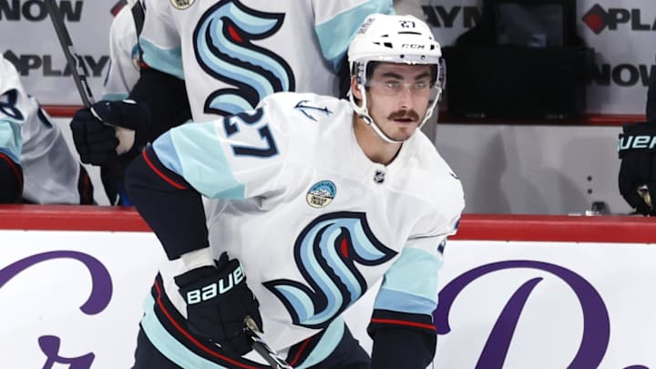 Oct 23, 2025; Winnipeg, Manitoba, CAN; Seattle Kraken left wing Mason Marchment (27) skates up the ice in a game against the Winnipeg Jets in the third period at Canada Life Centre. Mandatory Credit: James Carey Lauder-Imagn Images