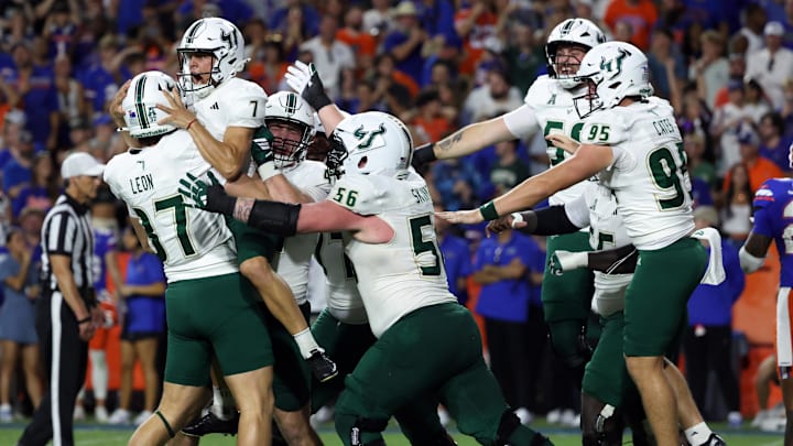 Sep 6, 2025; Gainesville, Florida, USA; South Florida Bulls place kicker Nico Gramatica (7) celebrates after he kicks the game winning field goal as time expires to beat the Florida Gators at Ben Hill Griffin Stadium.