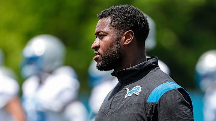 Detroit Lions assistant linebackers coach Shaun Dion Hamilton watches practice during mini camp 