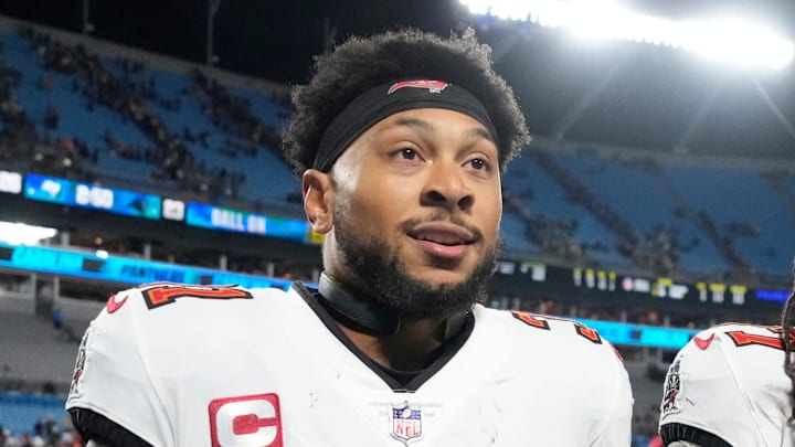Dec 1, 2024; Charlotte, North Carolina, USA; Tampa Bay Buccaneers safety Antoine Winfield Jr. (31) and cornerback Tavierre Thomas (37) leave the field after the game at Bank of America Stadium. Mandatory Credit: Bob Donnan-Imagn Images