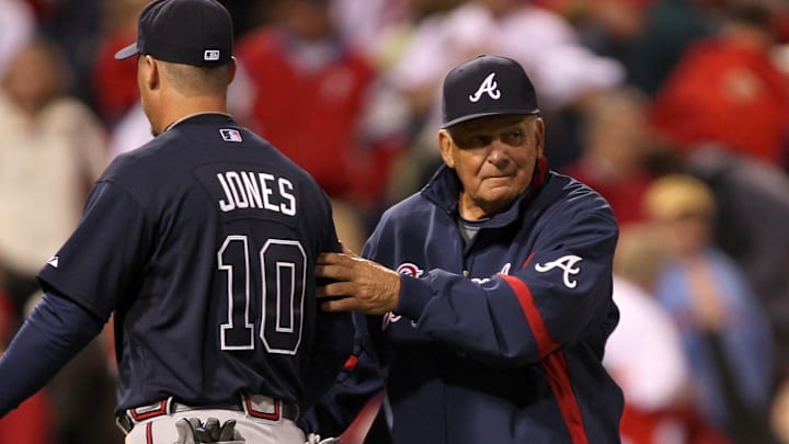 Bobby Cox, right, congratulates Chipper Jones after a Braves win. Bobby Cox, right, congratulates Chipper Jones after a Braves win.