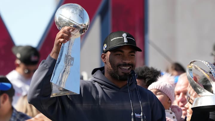 Feb 16, 2022; Los Angeles, CA, USA; Los Angeles Rams receiver Robert Woods holds the Vince Lombardi trophy during Super Bowl LVI championship rally at the Los Angeles Memorial Coliseum. Mandatory Credit: Kirby Lee-Imagn Images