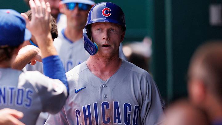 Aug 9, 2026; Kansas City, Missouri, USA; Chicago Cubs center fielder Pete Crow-Armstrong (4) celebrates in the dugout after scoring during the fourth inning against the Kansas City Royals at Kauffman Stadium. Mandatory Credit: William Purnell-Imagn Images